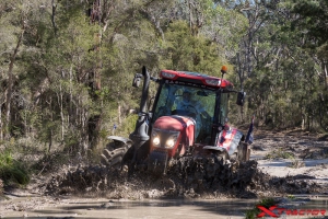 McComick tractor travelling in the forest